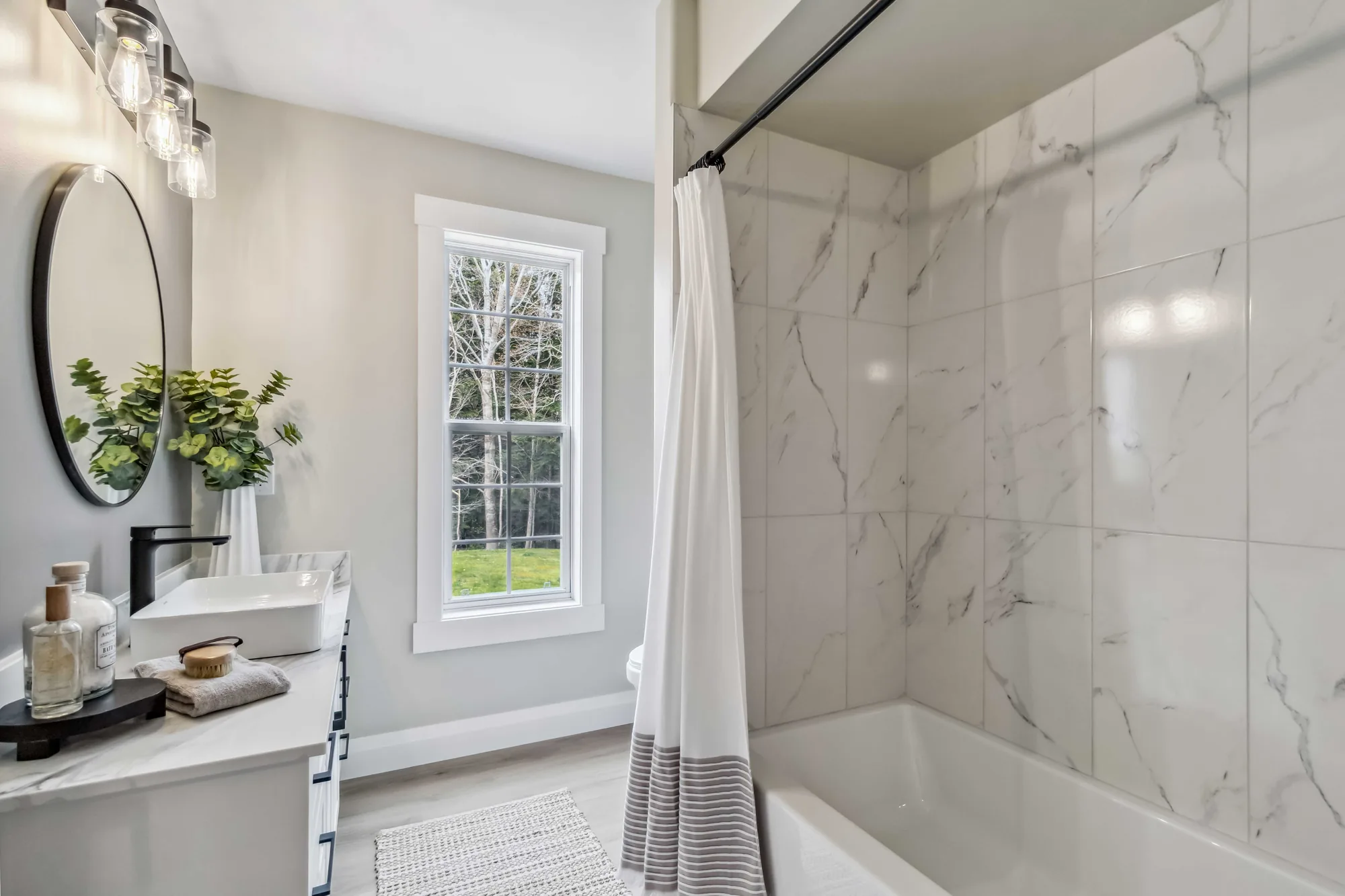 Gail Avenue — Main Bath, after the renovation by MAD Design Interiors