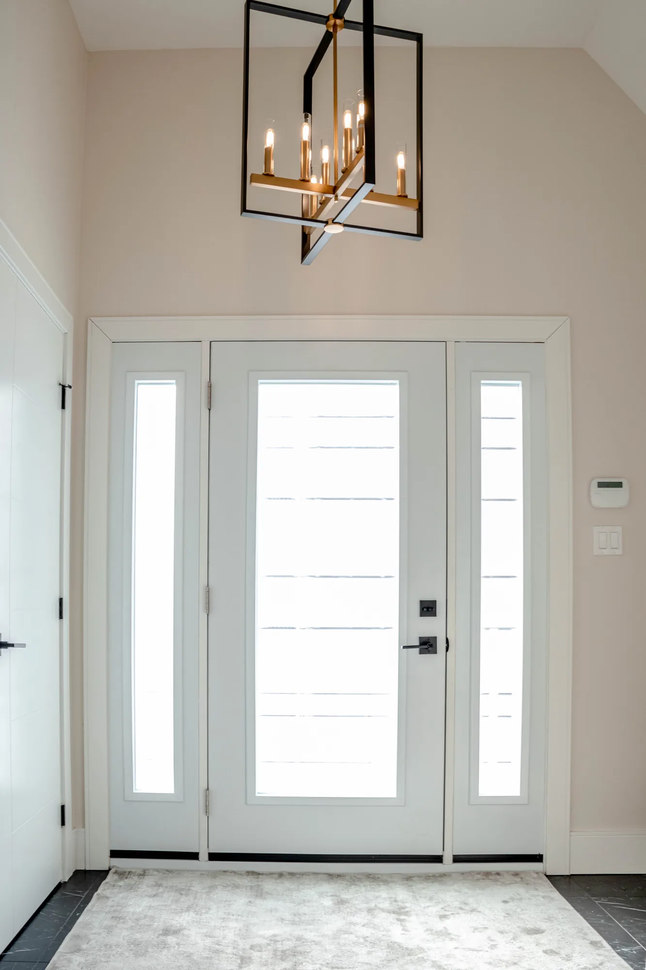 Spinnaker Drive — Entrance, after the renovation by MAD Design Interiors